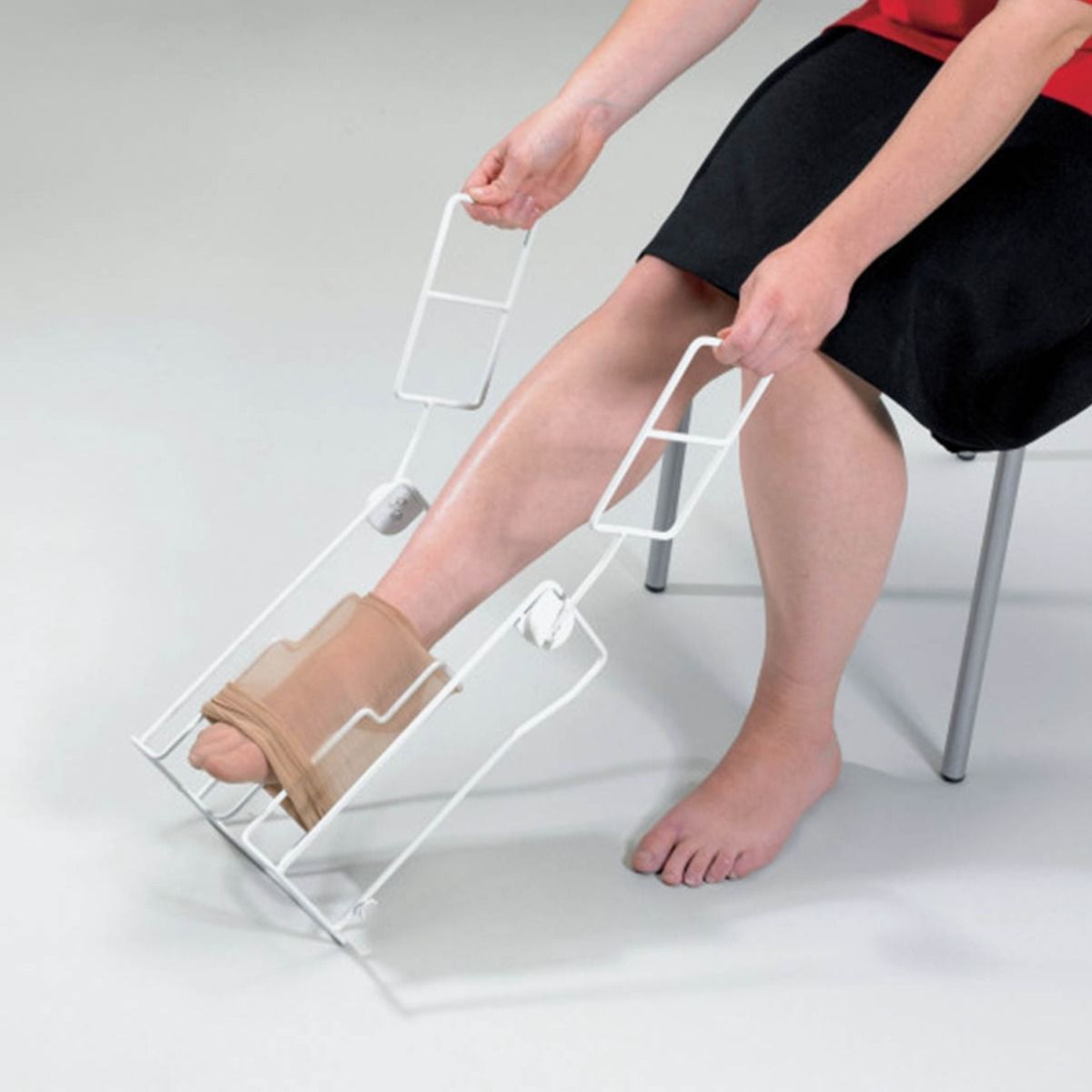 Enfile bas Donner est un accessoire pratique, compact et robuste, conçu pour faciliter l’habillage des seniors en vente chez ACAM